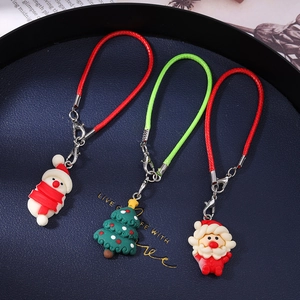 Christmas tree, snowman, and Santa Claus charms with colorful cords for phone and bags