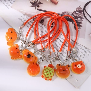 Cute resin animal bread charms with orange braided cords for phone and bags set of seven