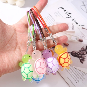 Colorful resin turtle phone charms with matching woven straps and lobster clasps