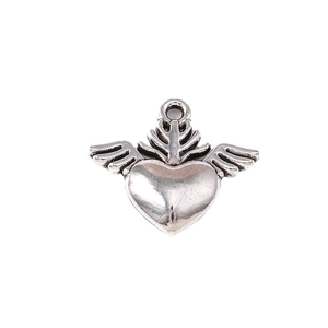 Retro alloy heart with wings charms for DIY jewelry making on white background
