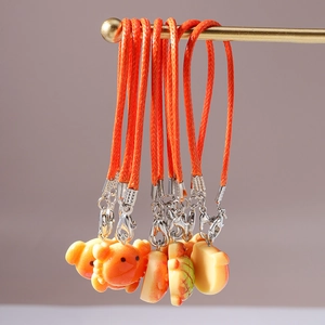 Cute resin ocean animal phone charms with bright orange braided cords and lobster clasps