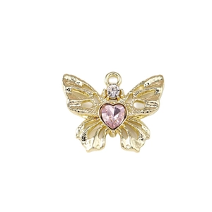 Schmetterling Anhänger mit rosa Herzkristall und goldenen Flügeln für Schmuckherstellung