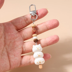 Porte-clés mignon avec brochettes d'animaux blancs et perles colorées avec crochet