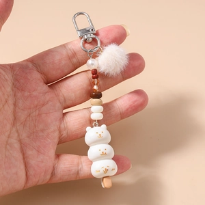 Porte-clés mignon brochette animal avec pompon en peluche et perles décoratives