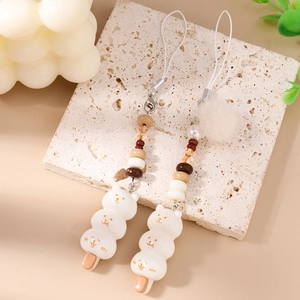 Charmant pendentif chat dango pour téléphone avec perles et pompon en peluche
