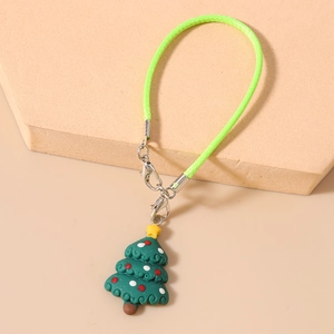 Detail of Christmas tree charm with green woven lanyard and a metal lobster clasp