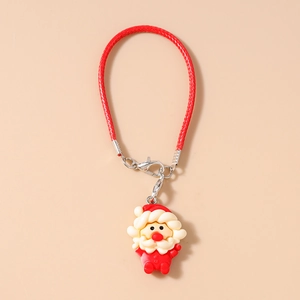 Close-up of red braided lanyard with festive Santa Claus pendant and metal clasp