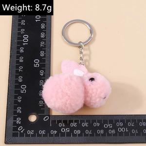 Detail showing weight of 8.7g for this plush pink bunny keychain with silver chain