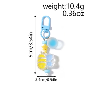 Detailed view of light blue bee keychain with star bead and size dimensions