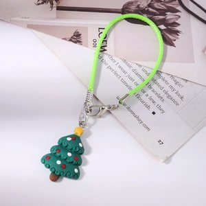 Detail of green braided leather phone strap with 3D resin Christmas tree charm