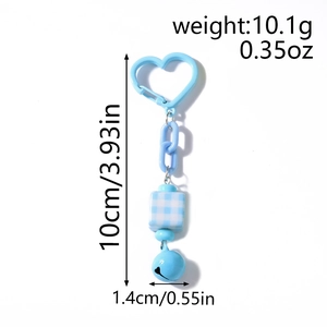 Blue chunky chain keychain with heart clasp, square beads, and bell showing dimensions