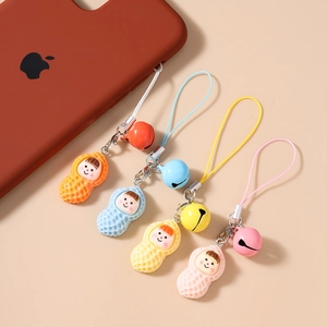 Cartoon peanut phone charm set with bells and colorful lanyards for mobile cases