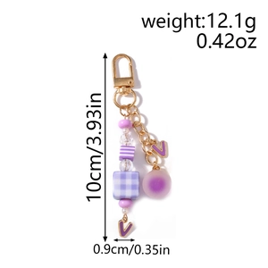 Detail of purple beaded keychain with gold clasp, checkered beads and dimensions info