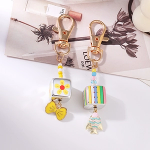 Beaded keychain with colorful goldfish and bow pendants for bag decoration