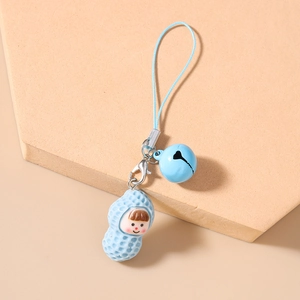 Detail of blue cartoon character phone charm with bell and lobster clasp connector