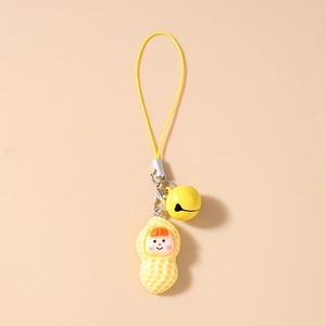 Detail of yellow bell and cartoon peanut charm with a woven cord for phones