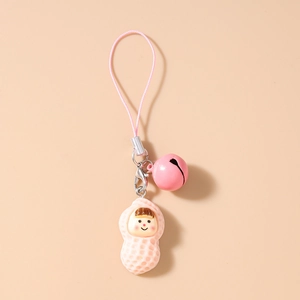 Detailed view of pink peanut-shaped cartoon pendant with a bell and matching lanyard