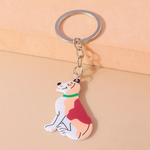 Detail of cute cartoon dog keychain with silver ring and colorful acrylic pendant