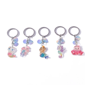 Glittery ocean animal keychains with resin octopus mermaid and seahorse charms