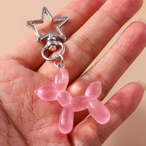 Portachiavi cane palloncino in resina rosa traslucida con chiusura a stella d'argento