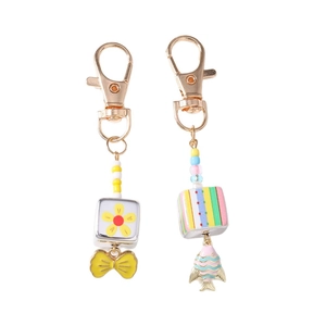 Fashionable beaded goldfish and bowknot charms for handbags or keychains