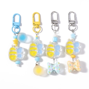 Cartoon bee beaded keychains with colorful charms and bows for bag decoration