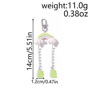 Detail showing dimensions and weight of rainbow cloud keychain with gummy bears and pearls