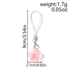 Détails montrant la longueur de 9cm et le poids du pendentif cerisier pour téléphone