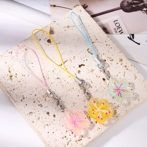 Bijoux de téléphone fleur en résine rose, jaune et bleu avec fermoirs mousquetons métal