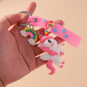 Porte-clés licorne en silicone rose avec breloque arc-en-ciel et bracelet à étoiles