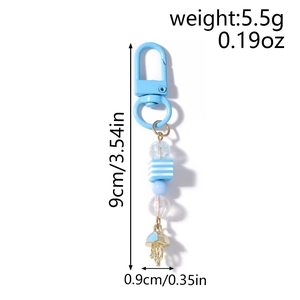 Detail of blue striped beads and jellyfish charm keychain with dimension measurements
