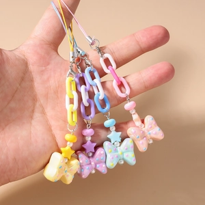 Colorful beaded phone strap with macaron acrylic chains and polka dot bow pendants