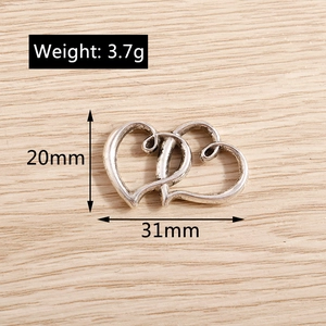 Interlocked double heart pendant in antique silver with size dimensions 31mm and 20mm