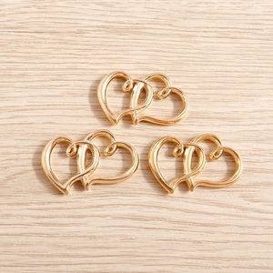 Interlocked double heart pendants in light gold finish for DIY jewelry making