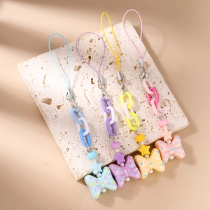 Y2K style beaded phone straps with acrylic stars and colorful polka dot butterfly charms