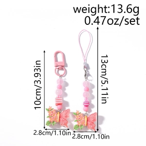 Pink butterfly phone charms with floral beads showing size and weight specifications