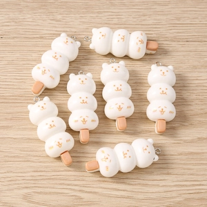Set of 7 creamy white cat-shaped resin dango pendants with silver metal hooks for DIY crafts