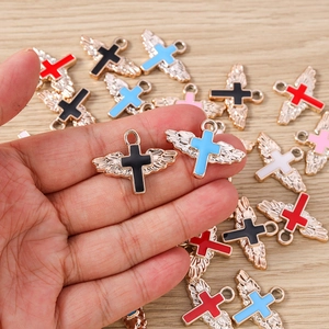 Colorful enamel angel wing cross pendants for DIY jewelry making in various vibrant colors