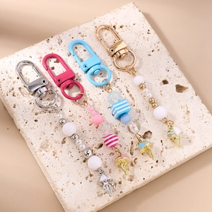 Creative beaded jellyfish keychain with pearls and stripes tassels in four colors