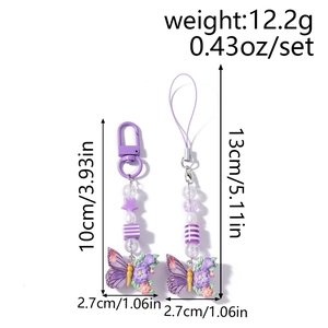 Detail of purple butterfly charms and floral bead straps for phone or keychains
