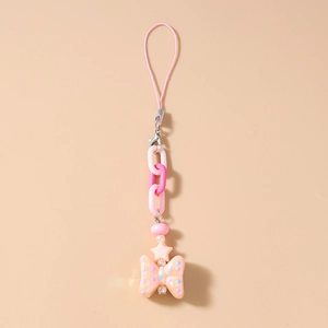 Close-up of pink beaded phone charm with star bead, chain links, and polka dot bow pendant