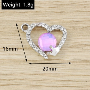 Detailed view of a silver heart pendant with purple rhinestone and crown detail, size 16x20mm
