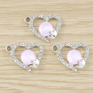 Silver heart pendants with pink gemstones and crown charms for DIY jewelry making