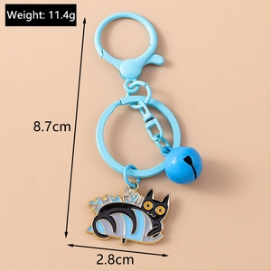 Detailed view of sky blue cartoon cat keychain with bell and enamel lobster clasp