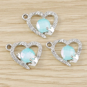 Sparkling heart pendants with blue rhinestones and crown detail for DIY jewelry making