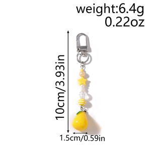 Detail showing a yellow pear charm with pentagram star beads and silver metal clasp