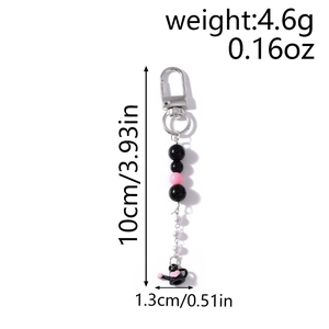 Vue détaillée des dimensions du porte-clés perles théière à cœur rose avec perles noires