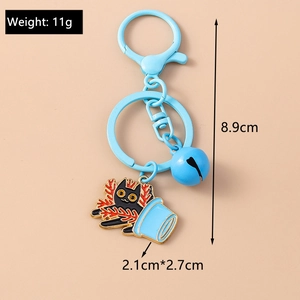 Detailed view of 11g cartoon black cat keychain with blue ring, bell and enamel pendant