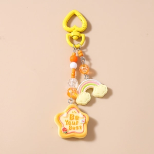 Close-up of colorful beaded keychain with yellow heart clasp and rainbow pendant