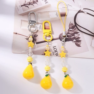 Handmade yellow star beaded phone charm with pear drop pendant and metal clips